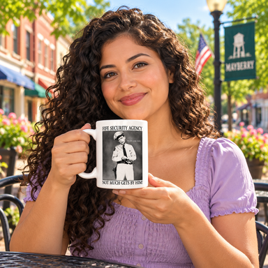 Model enjoying coffee with Fearless Fife Security Agency Mug on Mayberry Main Street