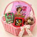Hello Doll Sweetheart in a Blush pink heart-shaped wicker basket with one arched handle — styled preview