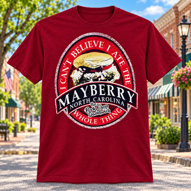 Mayberry Pork Chop Sandwich T-Shirt in Red against a bright Mayberry Main Street background