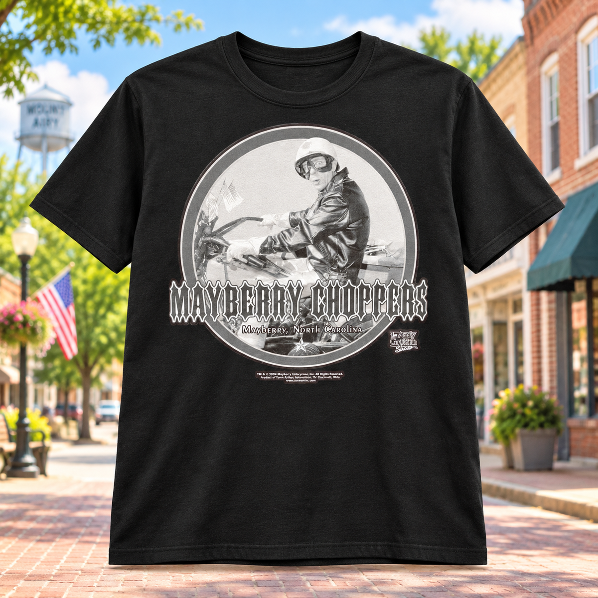 Mayberry Choppers T-Shirt in Black against a bright Mayberry Main Street background