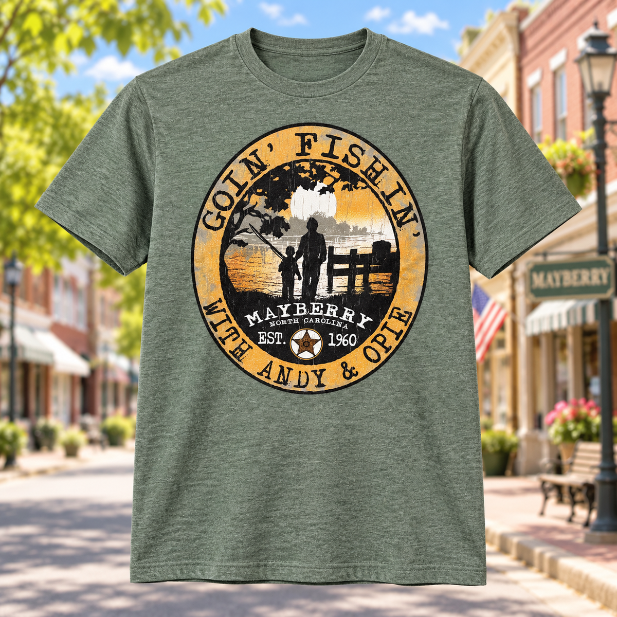 Goin’ Fishin’ with Andy & Opie T-Shirt in Heather Green against a bright Mayberry Main Street background