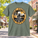 Goin’ Fishin’ with Andy & Opie T-Shirt in Heather Green against a bright Mayberry Main Street background