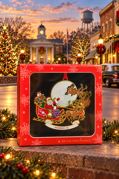 Santa's Sleigh Mayberry ornament in its red gift box against a festive Mayberry-themed backdrop