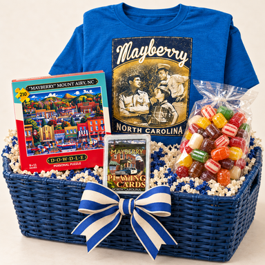 Mayberry Game Night in a Navy blue wide rectangular open wicker hamper with inset handholds — styled preview