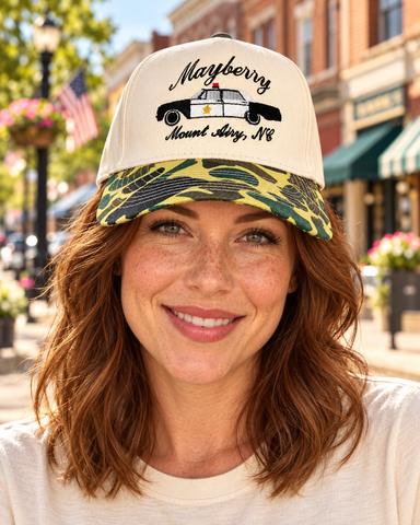 Model wearing Mayberry Hat 02 on a Mayberry-style downtown street