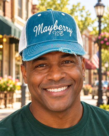 Model wearing Mayberry Hat 03 on a Mayberry-style downtown street