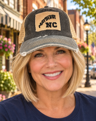 Model wearing Mayberry Hat 04 on a Mayberry-style downtown street