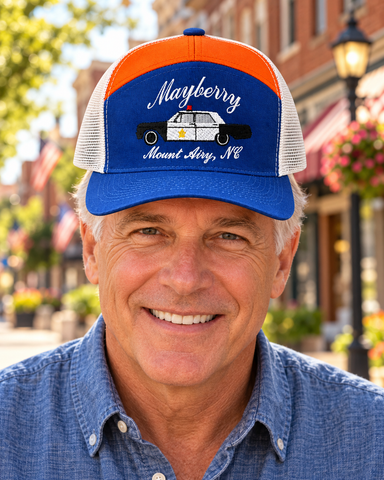 Model wearing Mayberry Hat 07 on a Mayberry-style downtown street