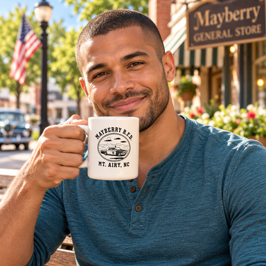 Model enjoying coffee with Mayberry Mug 26 on Mayberry Main Street