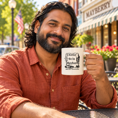 Model enjoying coffee with Mayberry Mug 29 on Mayberry Main Street