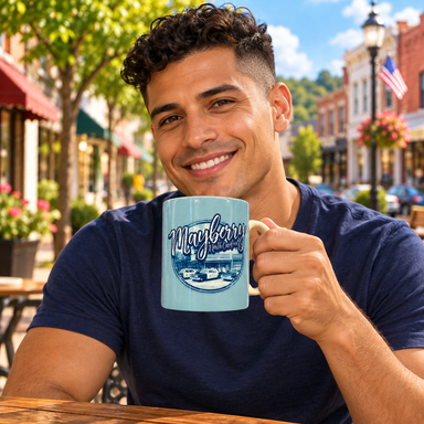 Model enjoying coffee with Mayberry North Carolina Main Street Blue Mug on Mayberry Main Street