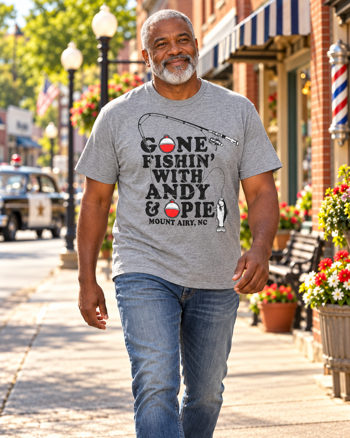 Man walking on Mayberry Main Street wearing Gone Fishin’ with Andy & Opie Tee