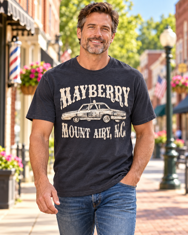 Model wearing Mayberry Mount Airy Squad Car T-Shirt on Mayberry Main Street