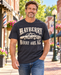 Model wearing Mayberry Mount Airy Squad Car T-Shirt on Mayberry Main Street