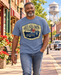 Man walking on Mayberry Main Street wearing Mayberry America’s Original Hometown Tee
