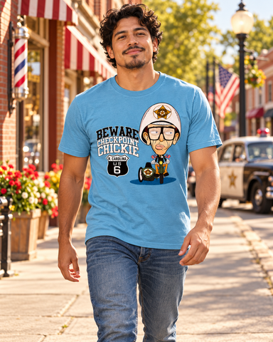 Man walking on Mayberry Main Street wearing Beware Checkpoint Chickie Tee