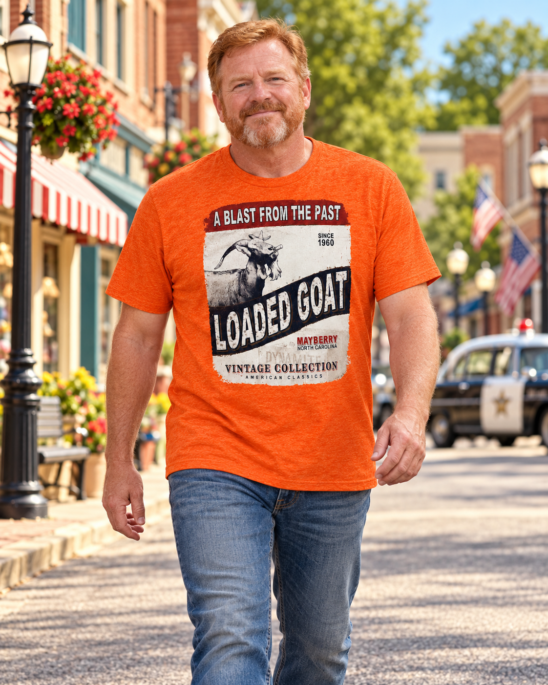 Man walking on Mayberry Main Street wearing Loaded Goat Mayberry Tee