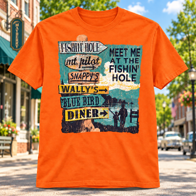 Meet Me at the Fishin’ Hole T-Shirt in orange against a bright Mayberry Main Street background