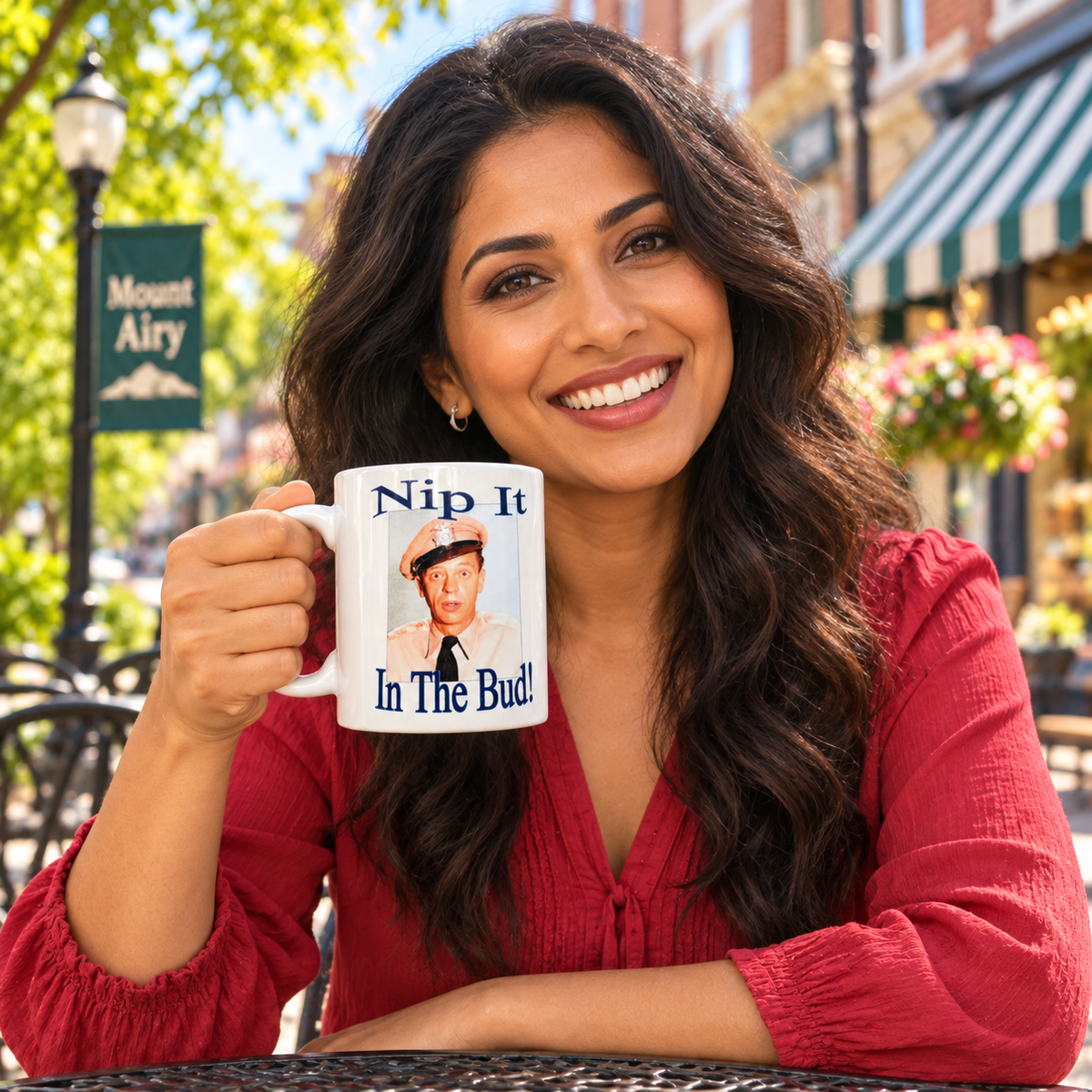 Model enjoying coffee with Nip It in the Bud Barney Fife Portrait Mug on Mayberry Main Street