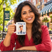 Model enjoying coffee with Nip It in the Bud Barney Fife Portrait Mug on Mayberry Main Street